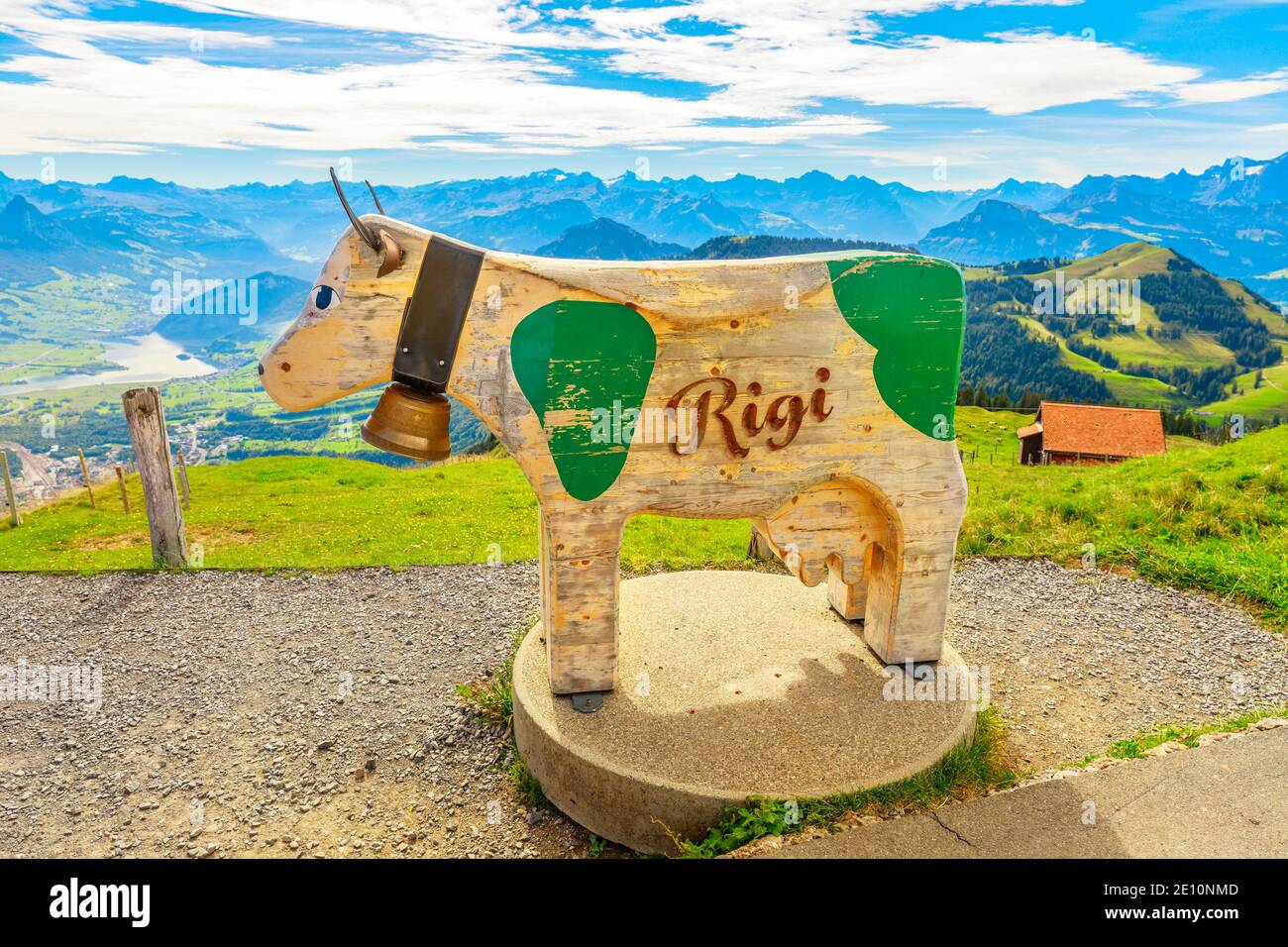 Rigi kulm, Switzerland - Aug 25, 2020: Wooden sculpture of cow on top of Mount Rigi, the highest peak around Lake Lucerne. Stock Photo