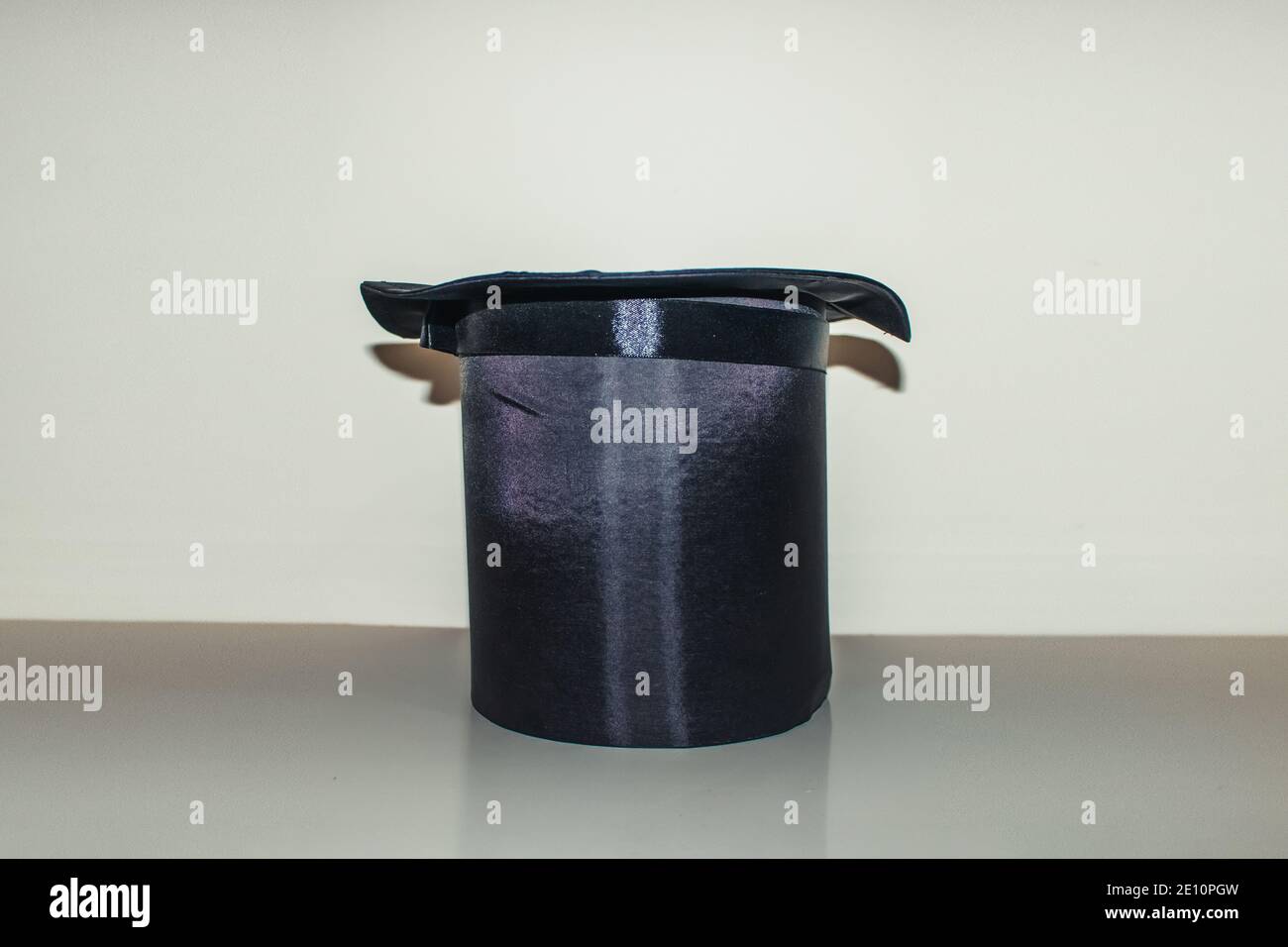 Black magic hat isolated on white background for concept image Stock