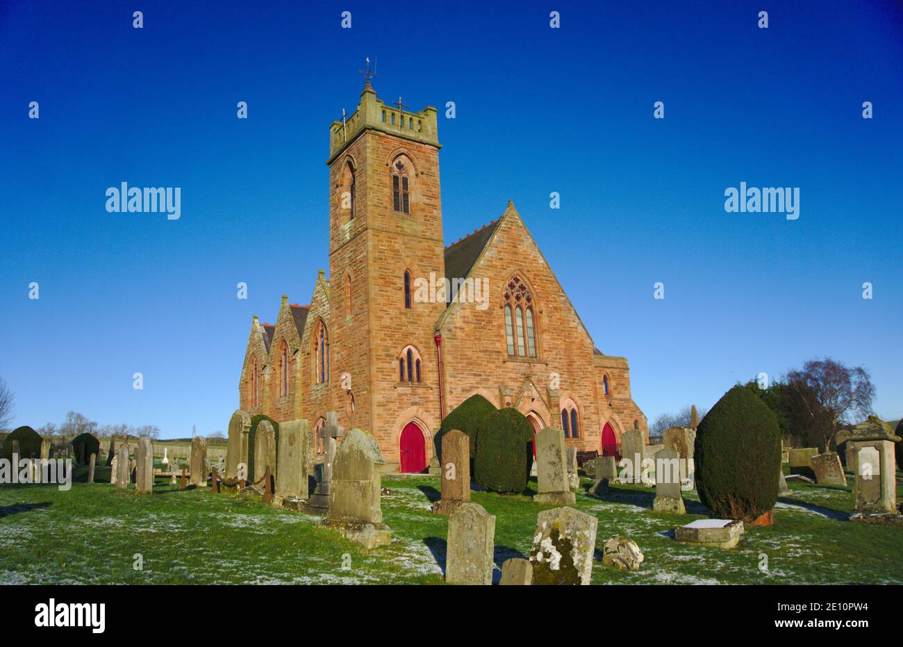 Earlston Parish Church and graveyard with light snow on the grass, Earlston, Berwickshire, Scottish Borders, Scotland, UK. Stock Photo