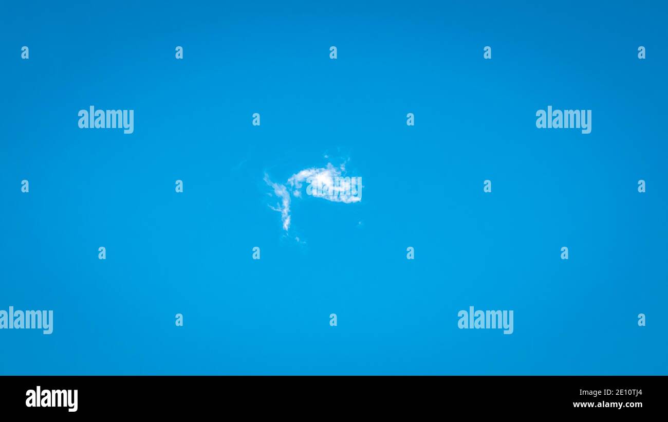 Small single Fluffy Clouds Blue Sky Single White Cloud Blue Stock Photo