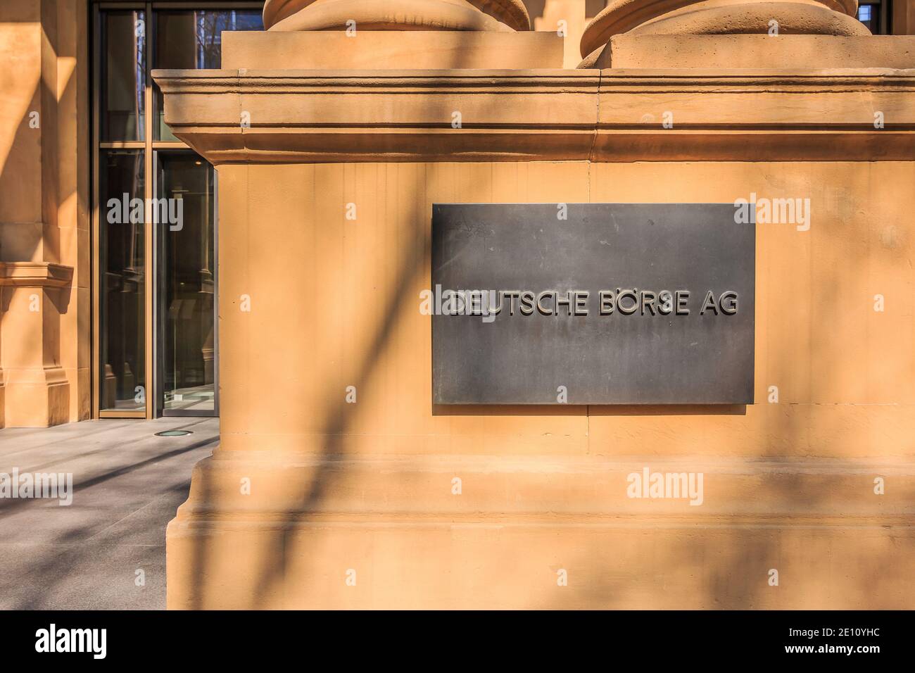 Columns at the entrance with brown facade of the building of the German ...