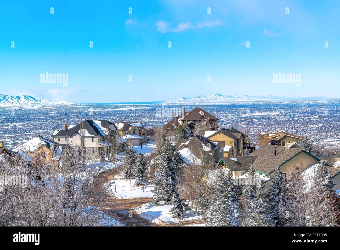 Aerial view of homes on mountain neighborhood with valley panorama ...