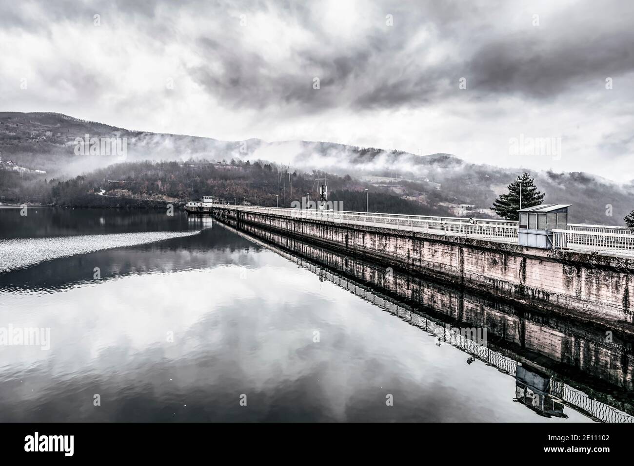 View on Hydro power plant Bajina Basta in fog, Serbia Stock Photo