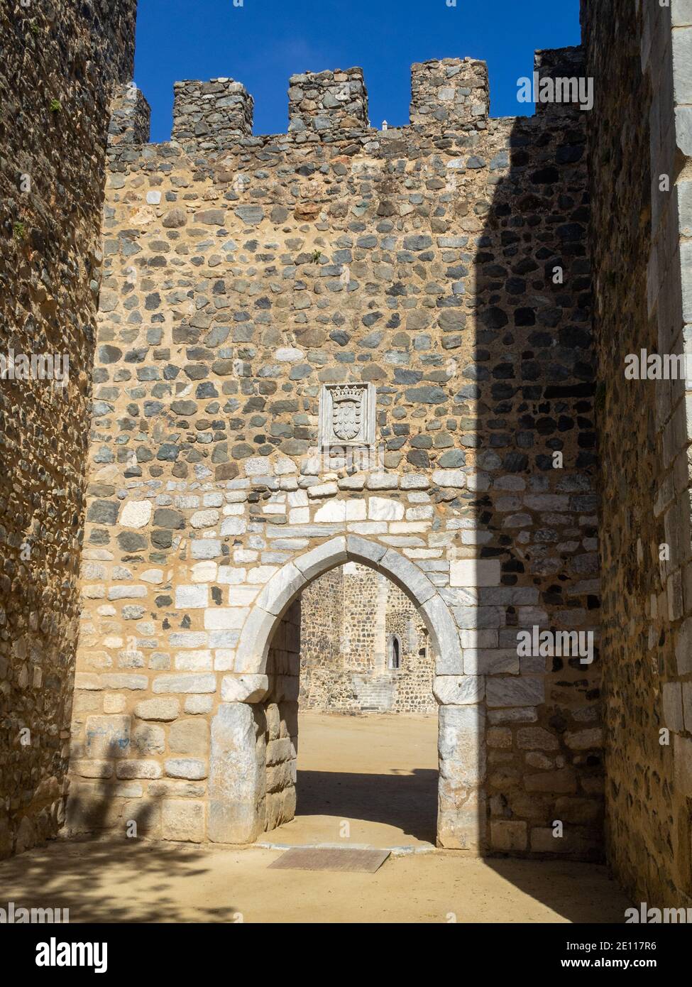 Beja Castle doorway arch under the battlement wall Stock Photo