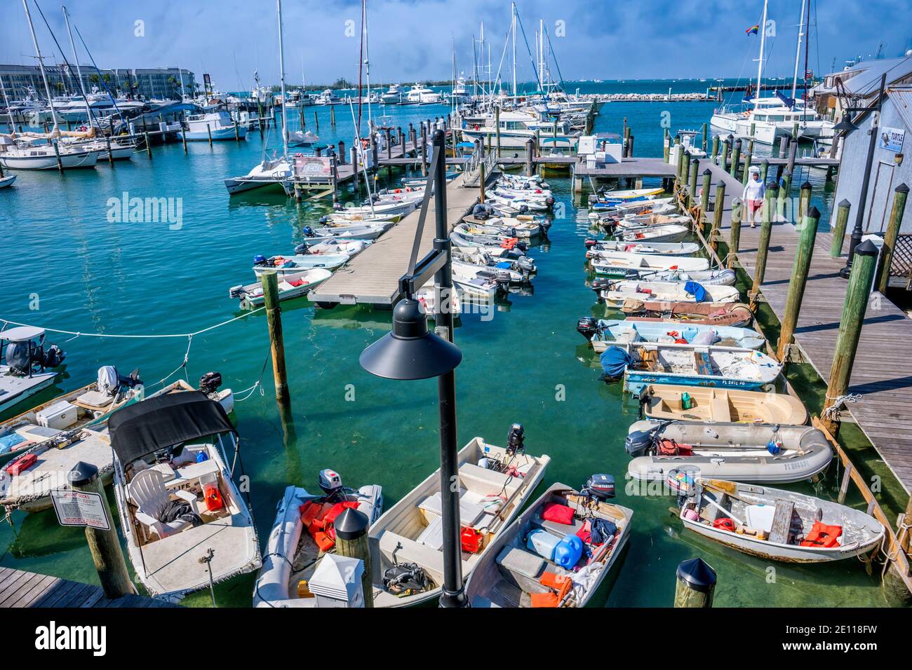 Motor and sailboats docked at the Conch Harbor Marina in Key West in
