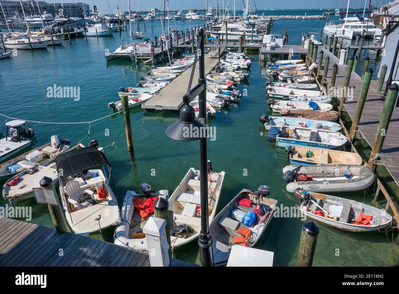 Motor and sailboats docked at the Conch Harbor Marina in Key West in