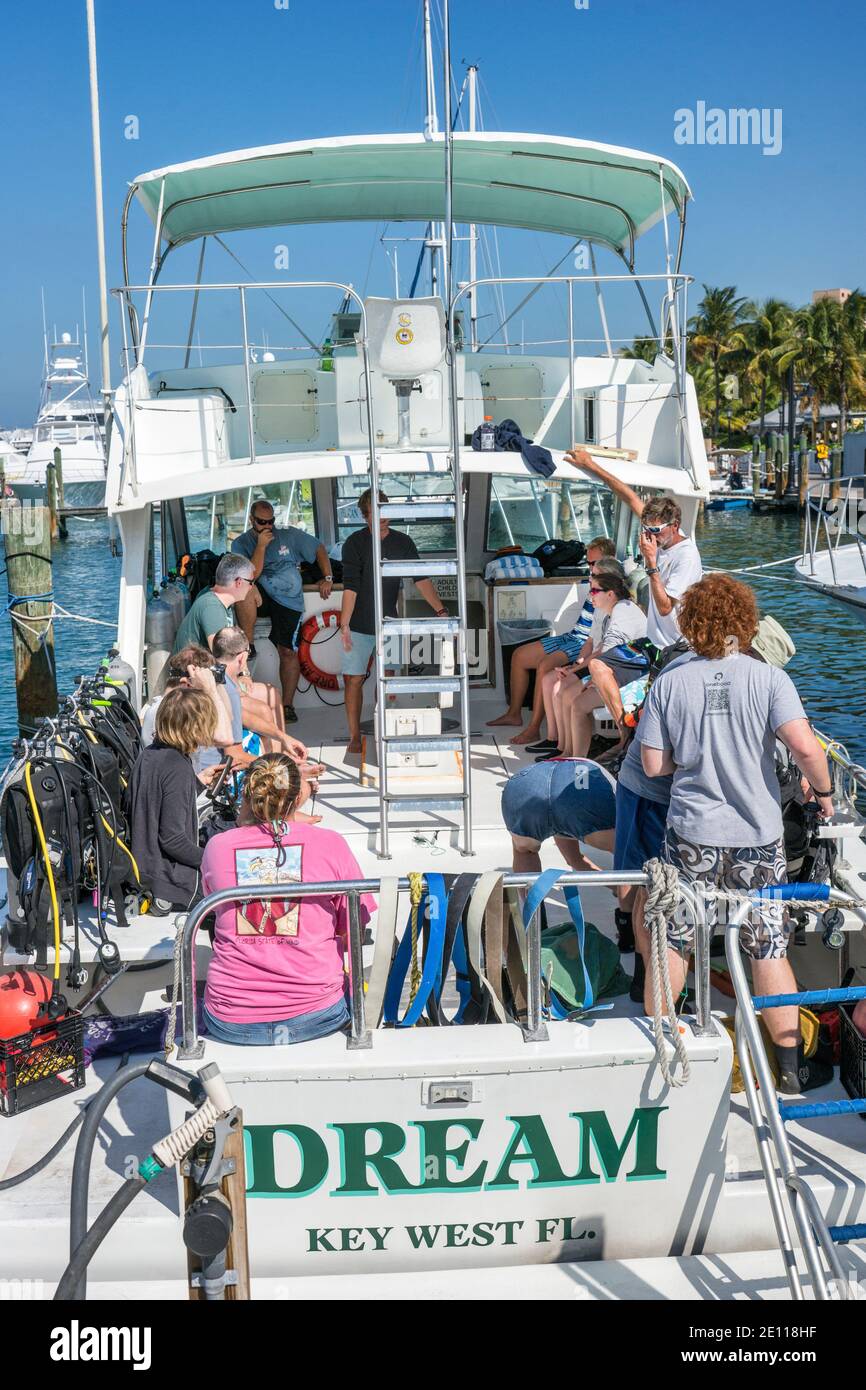 A diving charter boat prepares to depart from the Conch Harbor Marina