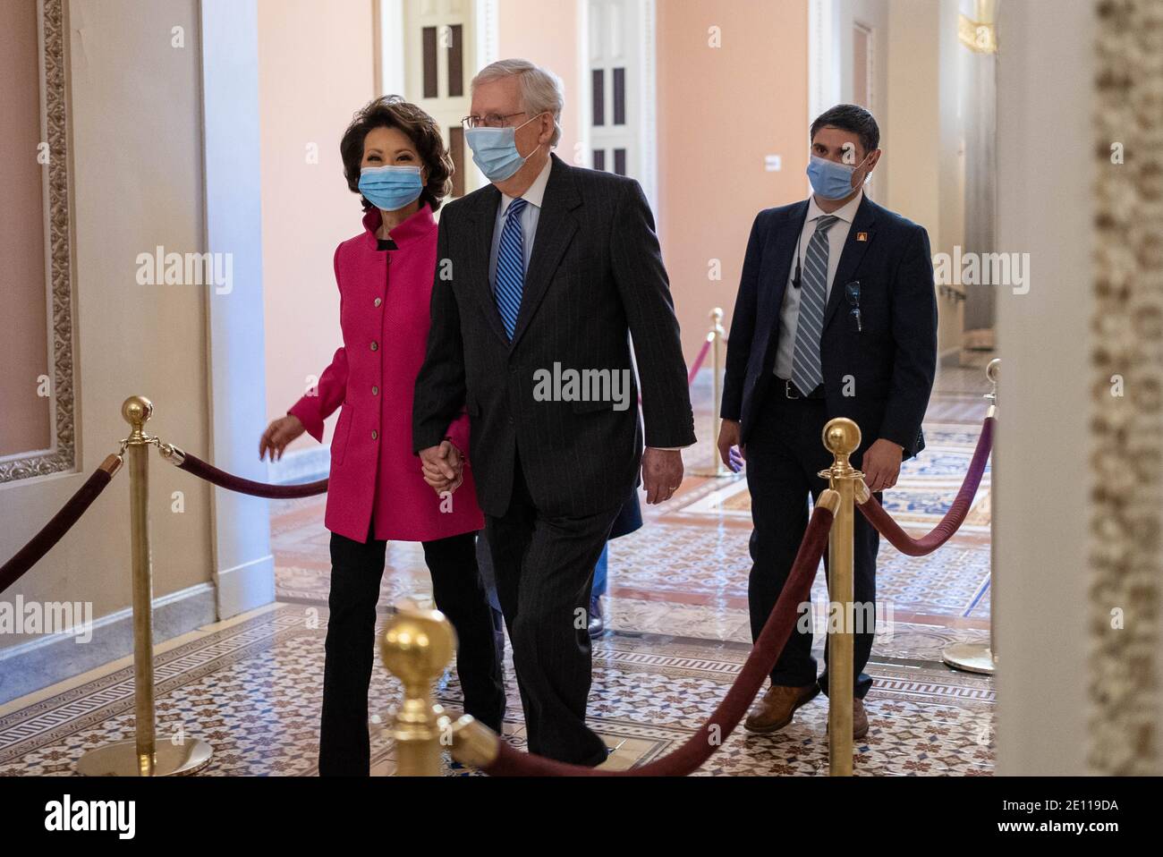 Washington, United States. 03rd Jan, 2021. U.S. Sen. Majority Leader Mitch McConnell (R-KY) walks with his wife Elaine Chao to the Senate Floor as both chambers are holding sessions to open the new 117th Congress on January 3, 2021 in Washington DC. Photo by Ken Cedeno/Sipa USA Credit: Sipa USA/Alamy Live News Stock Photo