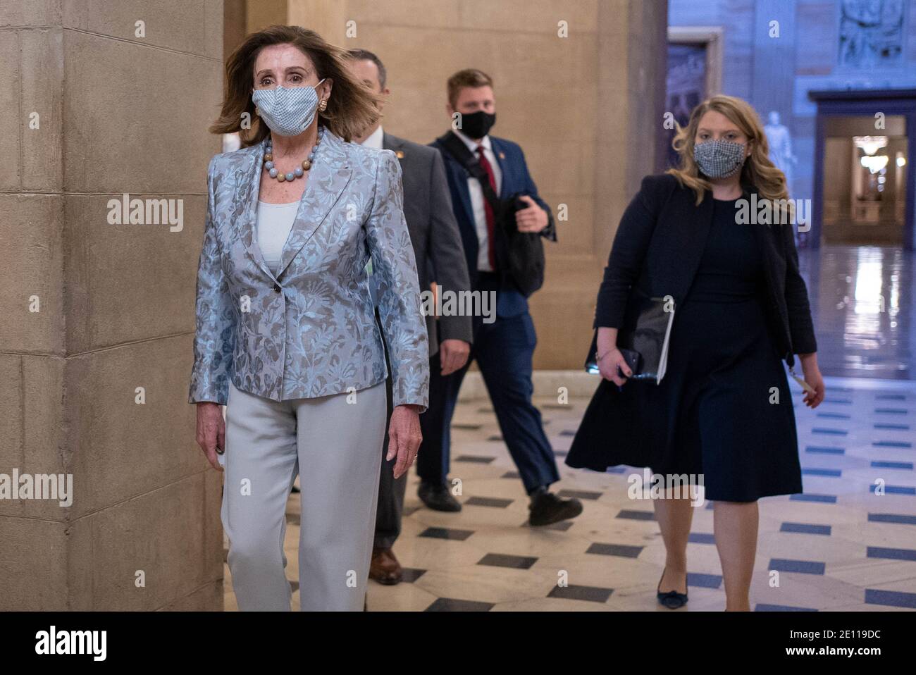 Washington, United States. 03rd Jan, 2021. Speaker of the House Nancy Pelosi, (D-CA) leaves her office and walks to the House floor as both chambers are holding sessions to open the new 117th Congress on January 3, 2021 in Washington DC. Photo by Ken Cedeno/Sipa USA Credit: Sipa USA/Alamy Live News Stock Photo