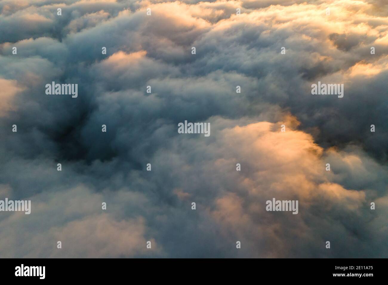 Airplane flying over pink clouds hi-res stock photography and images ...