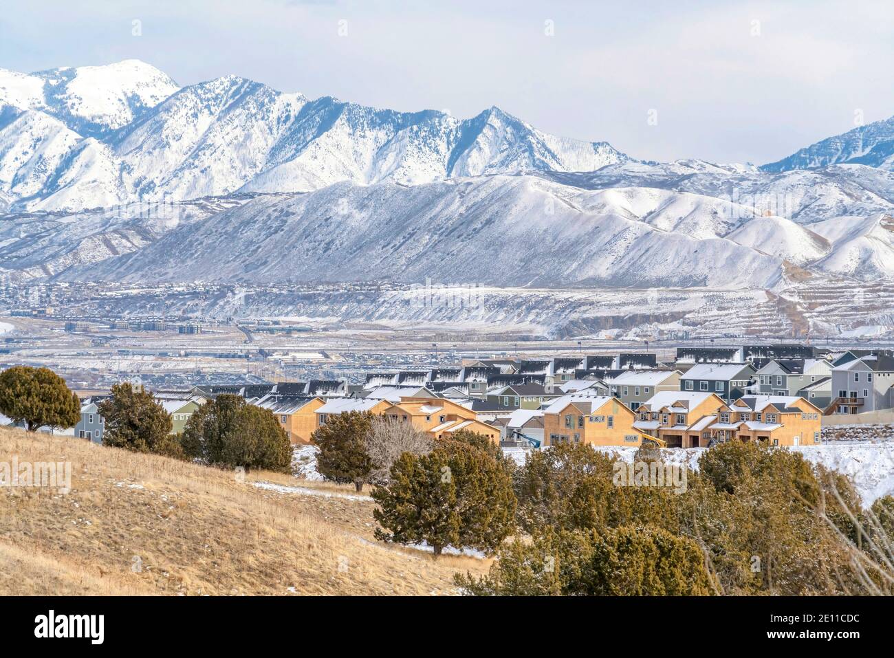 Snowy mountain and aerial view of houses in Utah Valley neighborhood in