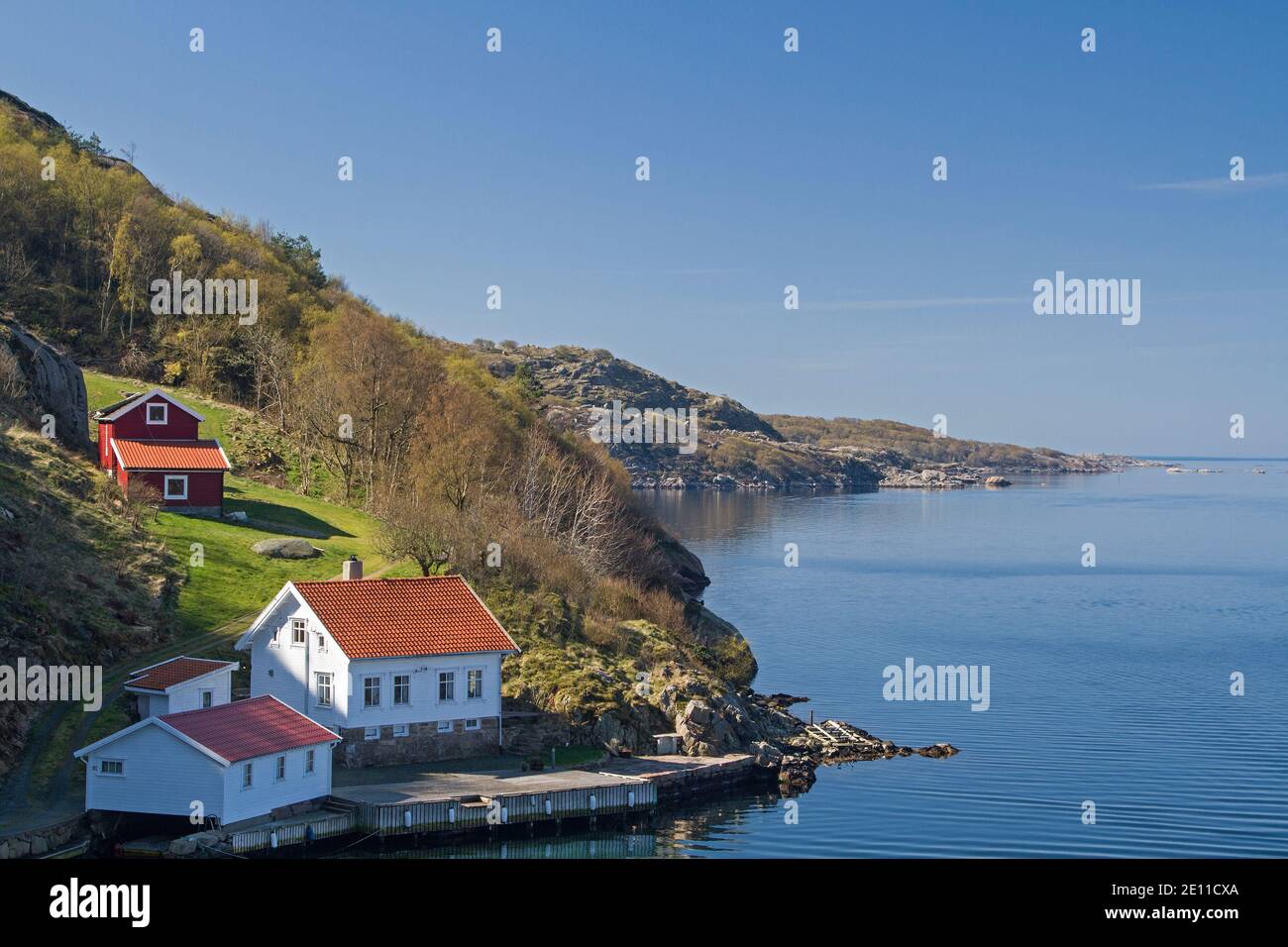 House Near Traneva, Which Lies On An Idyllic Fjord Arm Of The Spindalsfjorden Stock Photo