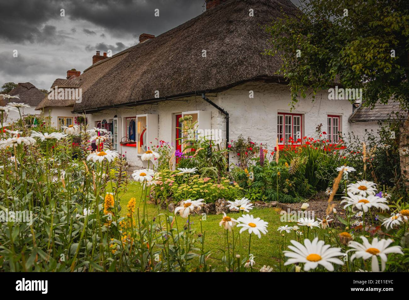 Adare, Ireland. Thatched cottage in the picturesque Village of Adare, Co. Limerick full of
