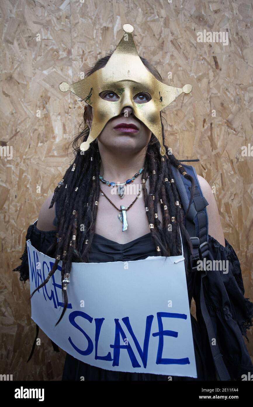 GREAT BRITAIN / England / London / A girl with sign wage slave outside Bank of England . Stock Photo