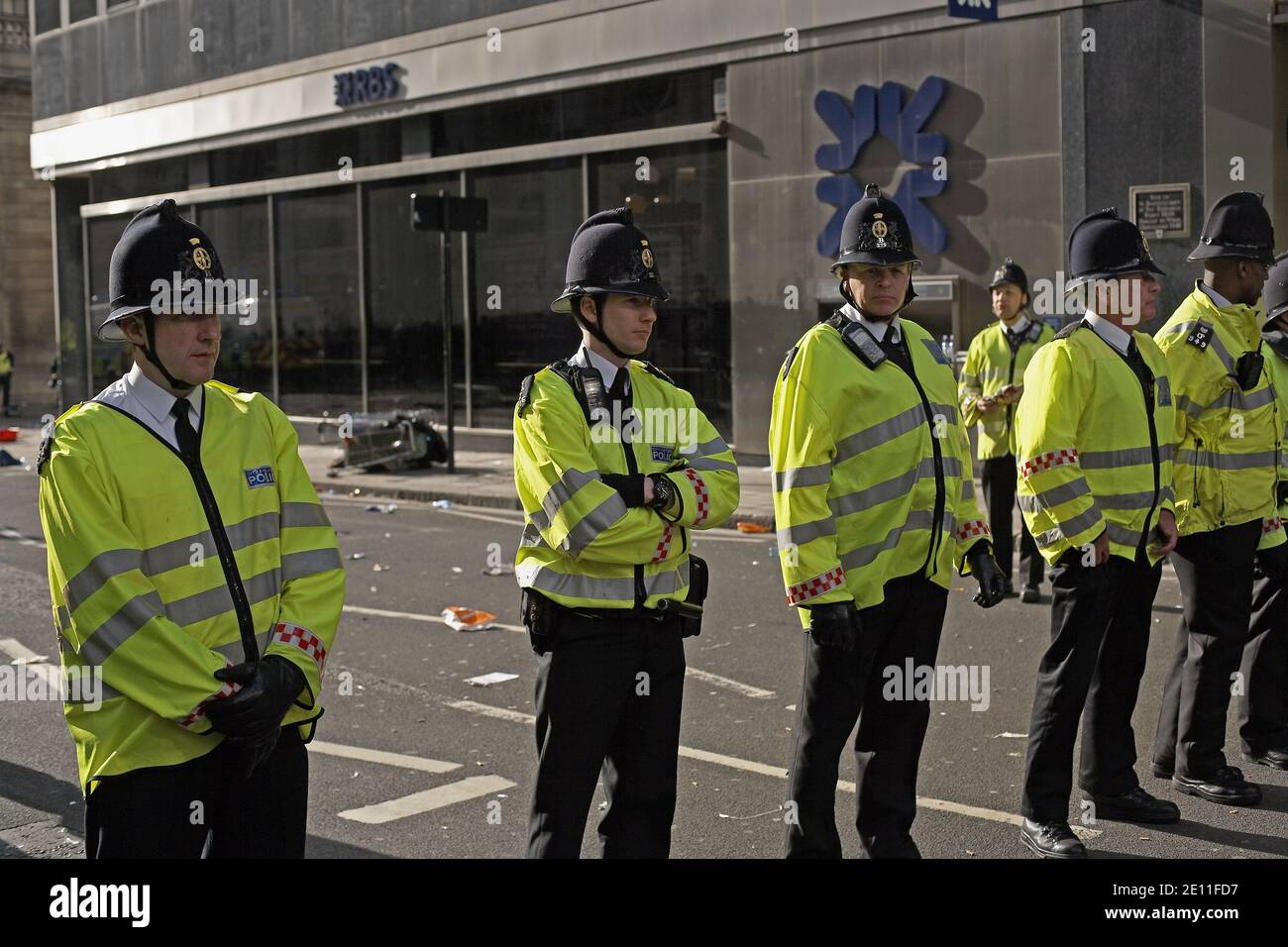 GREAT BRITAIN / England / London / Police block access to a branch of Royal bank of Scotland during  anti capitalist and climate change protest. Stock Photo