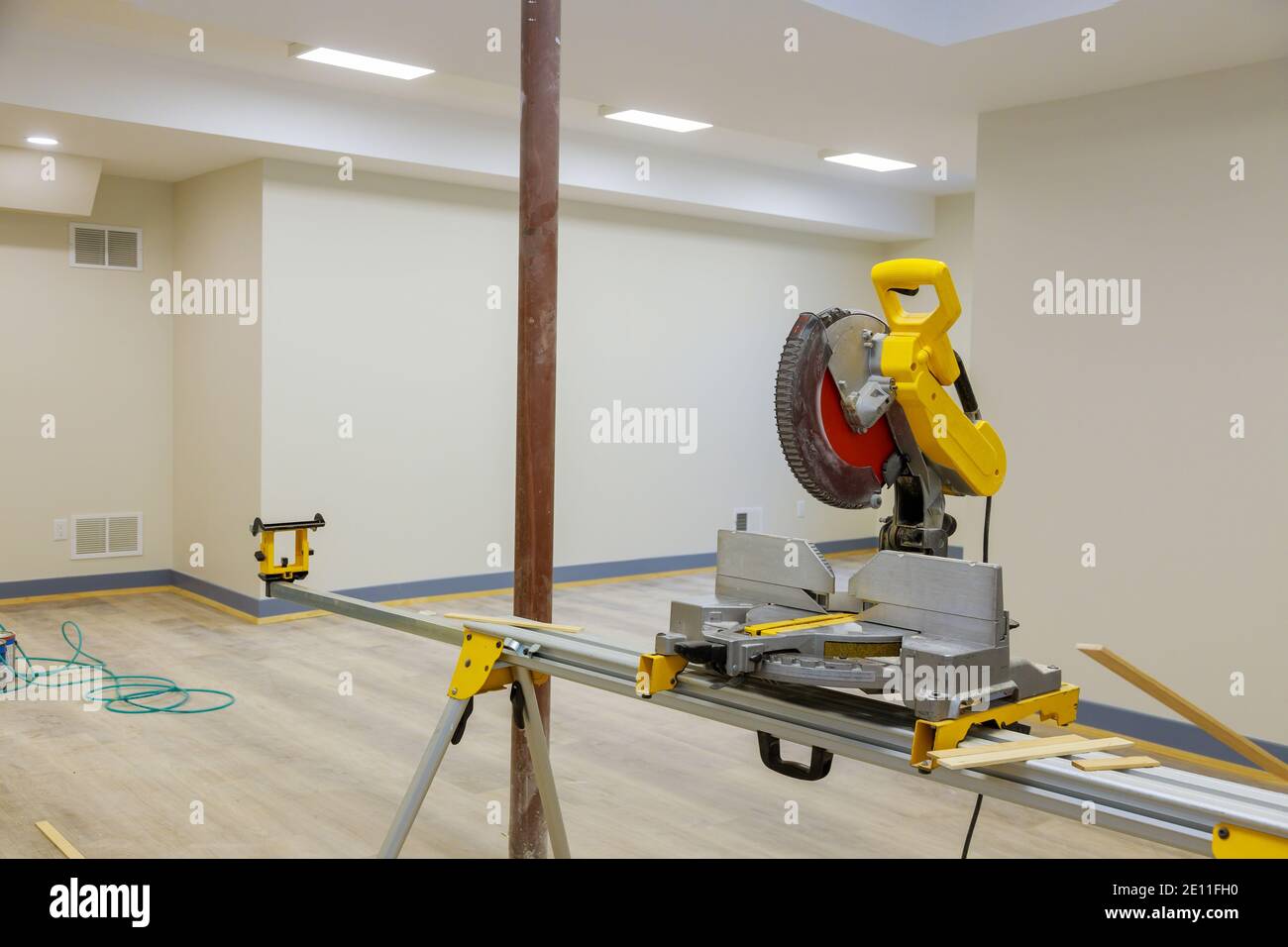 Construction remodeling home with close up of circular saw cutting wood