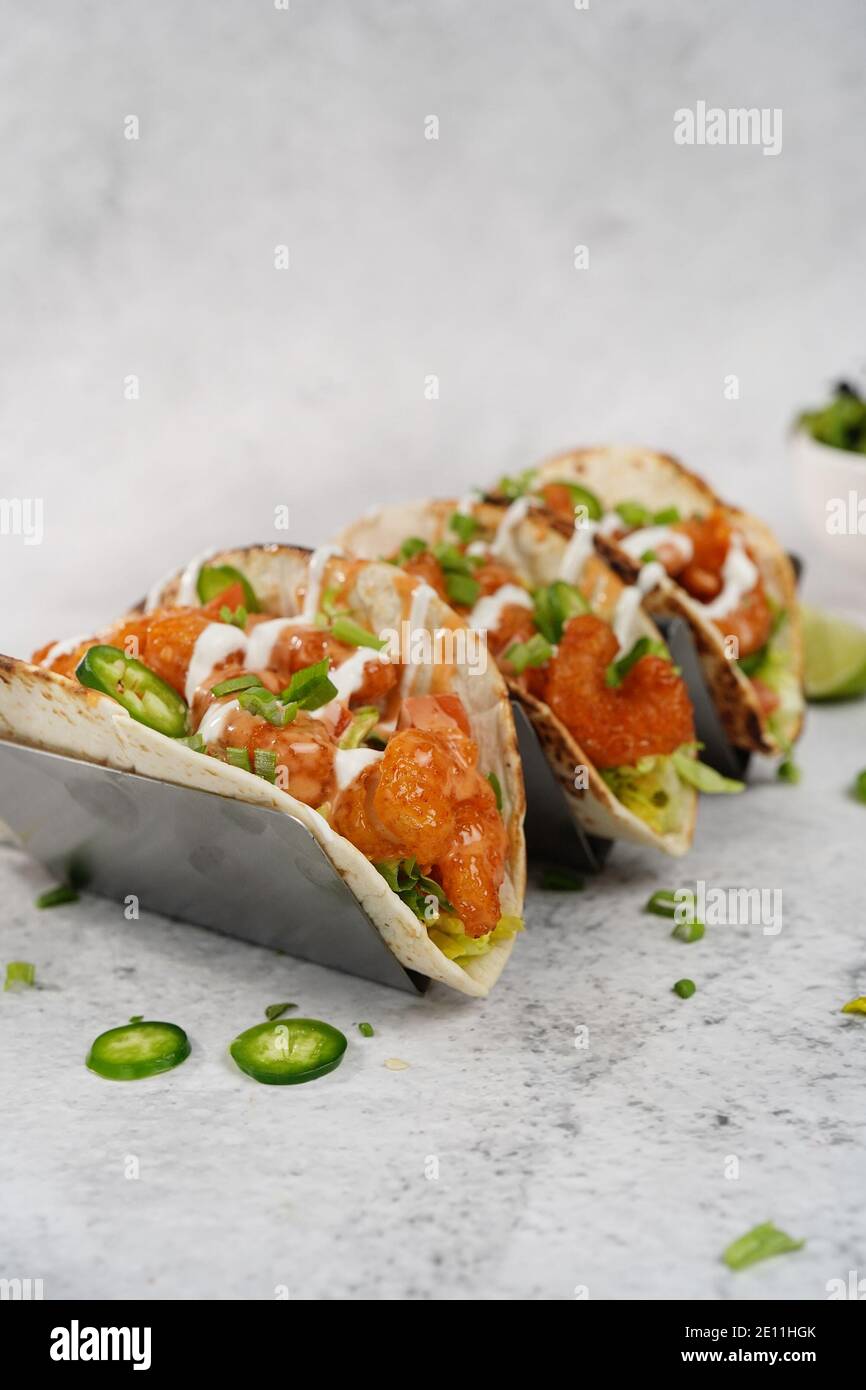 Bang Bang shrimp Tacos on soft taco shell Stock Photo Alamy