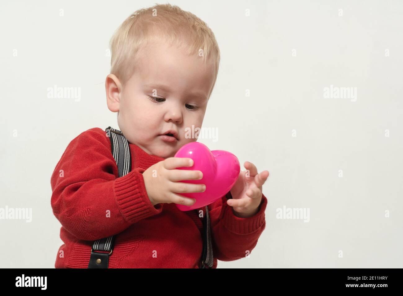 Boy in red jacket hires stock photography and images Alamy