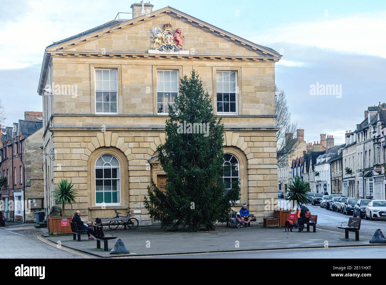 People enjoying the winter sun in Market Square in Woodstock at