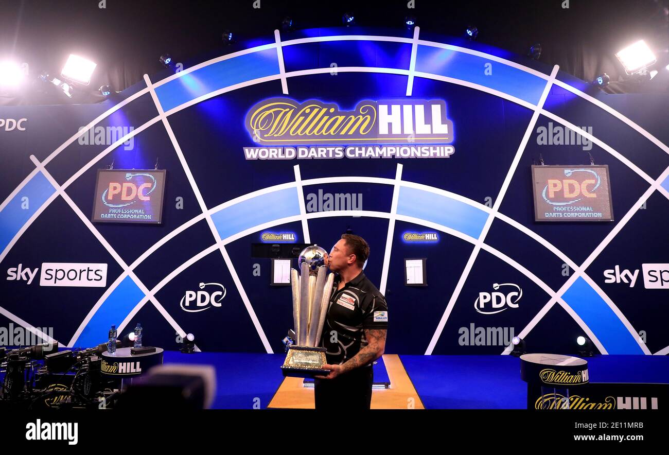 Gerwyn Price kisses the trophy after winning the William Hill World Darts  Championship at Alexandra Palace, London Stock Photo - Alamy