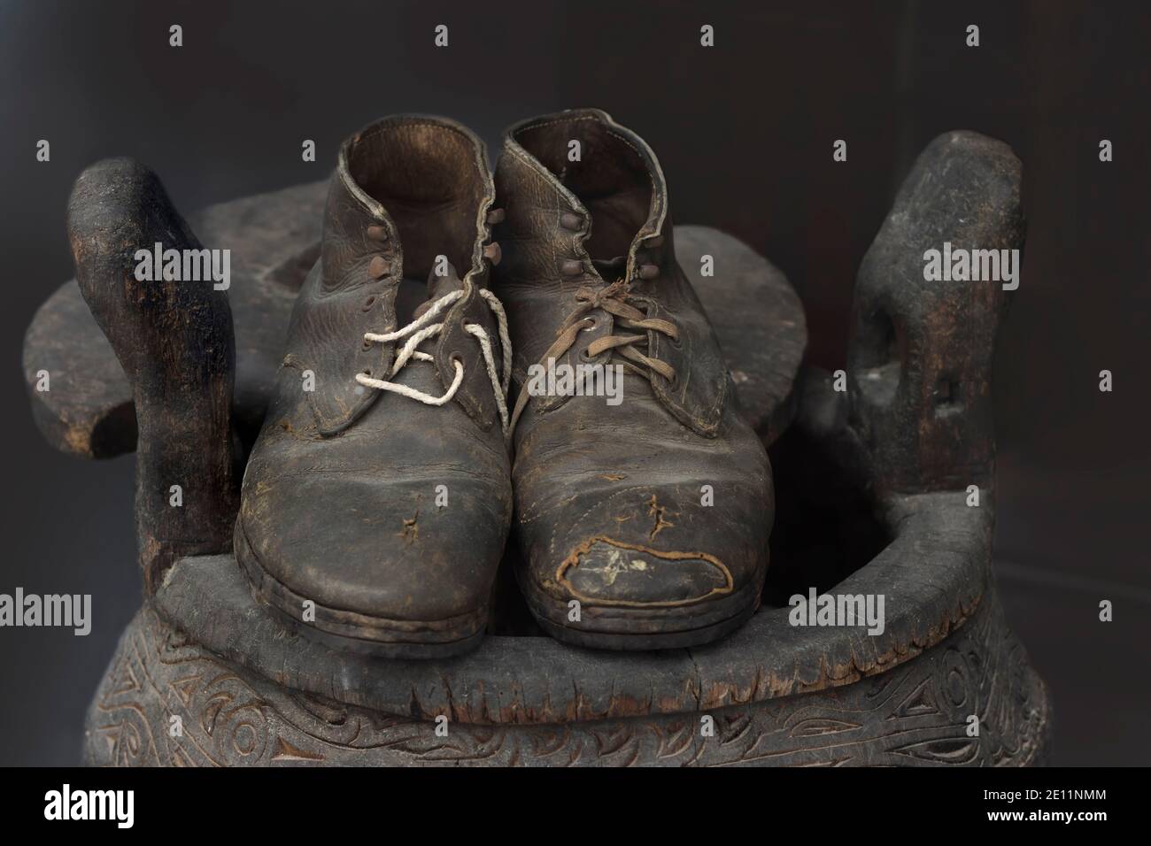 Old leather shoes in the shop window of a shoe shop, Berlin, Germany