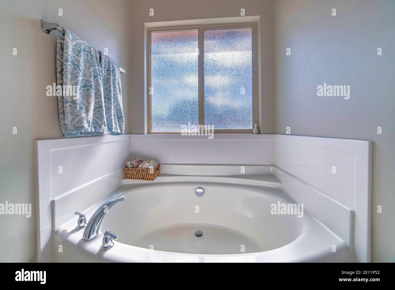 Round built in bathtub with stainless steel faucet inside residential ...