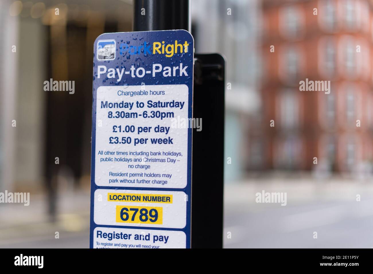 Pay to park street parking sign on a lamp post. London Stock Photo Alamy