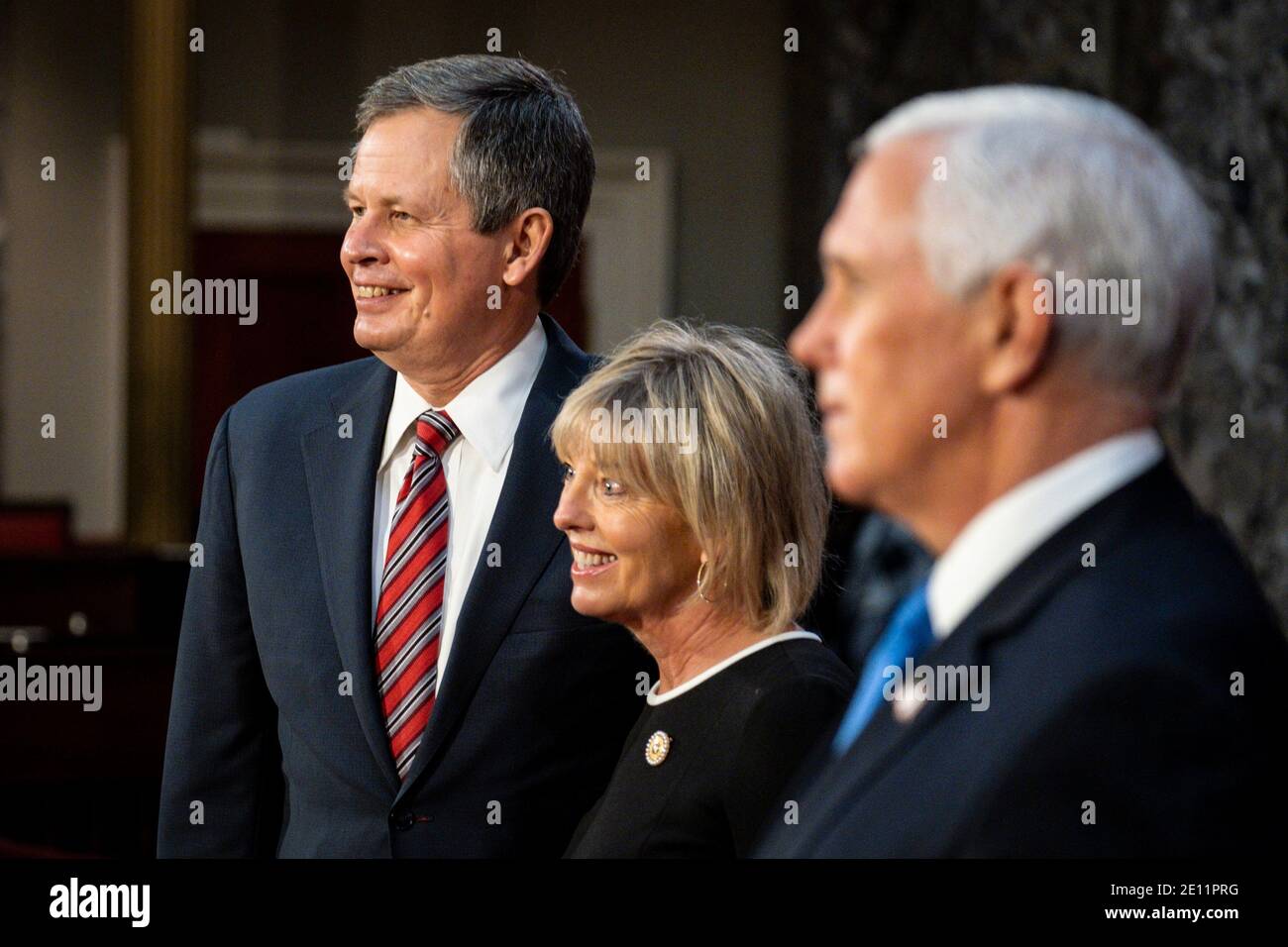 Washington, USA. 03rd Jan, 2021. Vice President Mike Pence poses for a photo with Senator Steve Daines (R-MT) and his wife, Cindy, during a mock swearing-in ceremony in the Old Senate Chamber on Capitol Hill on January 3, 2021 in Washington, DC. (Photo by Pete Marovich/Pool/Sipa USA) Credit: Sipa USA/Alamy Live News Stock Photo