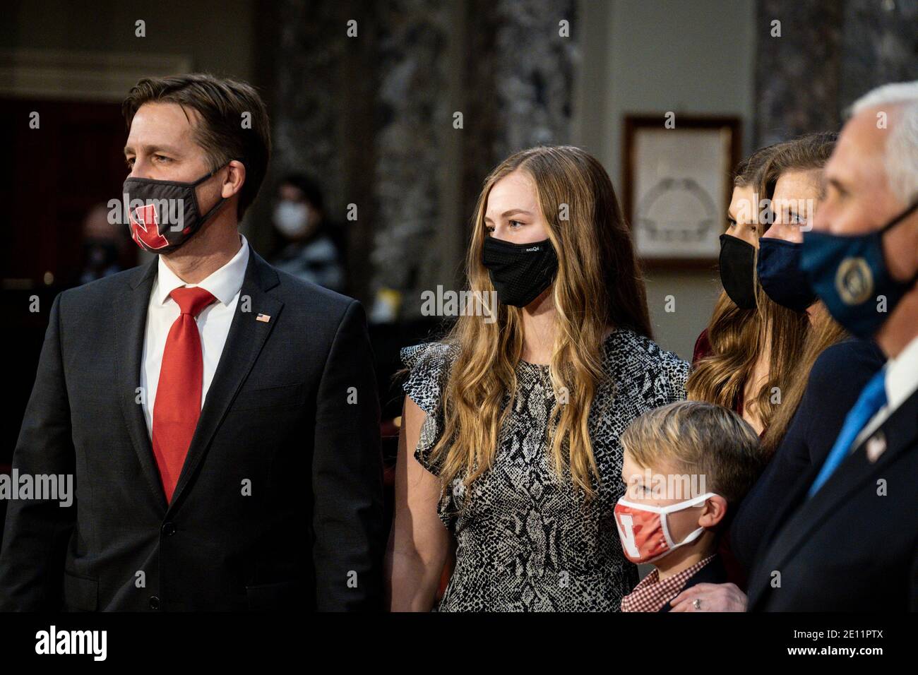Washington, USA. 03rd Jan, 2021. Vice President Mike Pence poses for a photo with Senator Ben Sasse (R-NB) and his family during a mock swearing-in ceremony in the Old Senate Chamber on Capitol Hill on January 3, 2021 in Washington, DC. (Photo by Pete Marovich/Pool/Sipa USA) Credit: Sipa USA/Alamy Live News Stock Photo