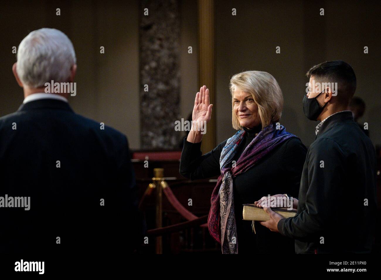 Washington, USA. 03rd Jan, 2021. Vice President Mike Pence administers the Senate oath of office to Cynthia Lummis (R-WY), during a mock swearing-in ceremony in the Old Senate Chamber on Capitol Hill on January 3, 2021 in Washington, DC. (Photo by Pete Marovich/Pool/Sipa USA) Credit: Sipa USA/Alamy Live News Stock Photo