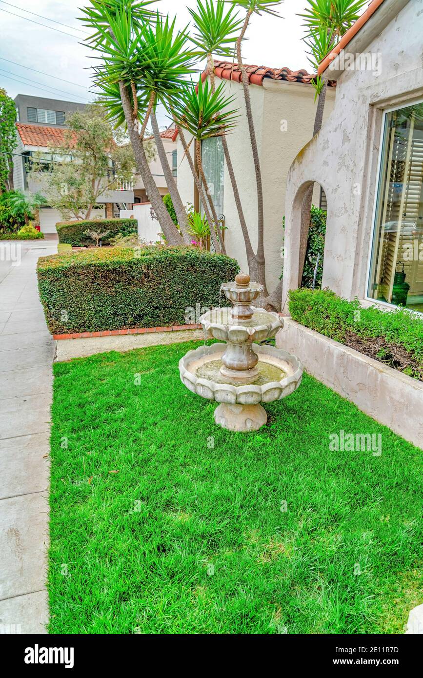 Three Tiered Fountain At The Landscaped Yard Of House In Long Beach California Stock Photo Alamy