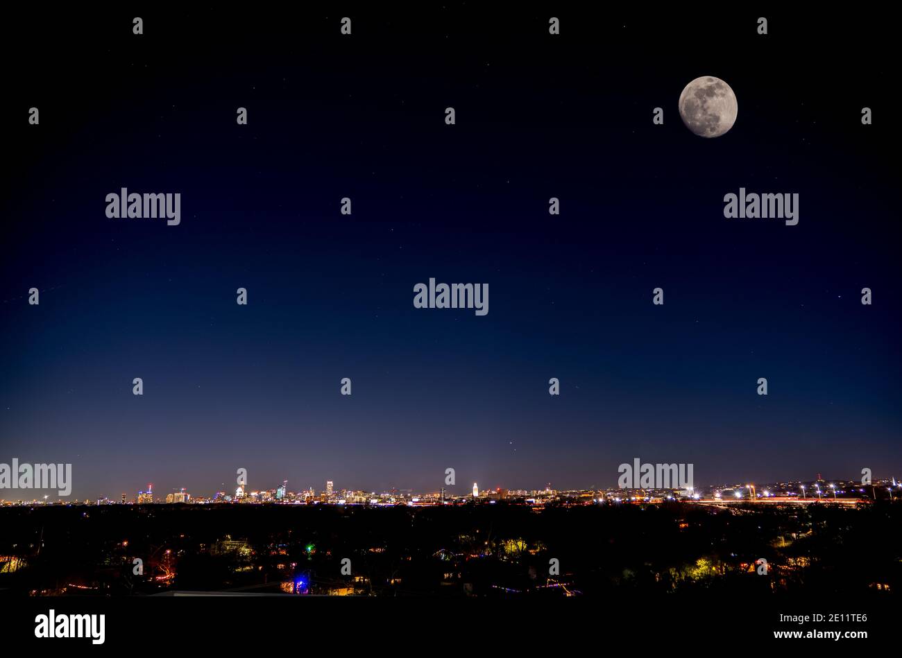 Night View of Downtown Austin Texas With Large Moon on the Dark Sky Stock Photo Alamy