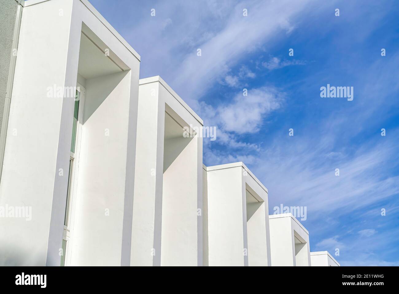 Projecting Window Frame Exterior of modern townhouse with projecting window frames and flat ...