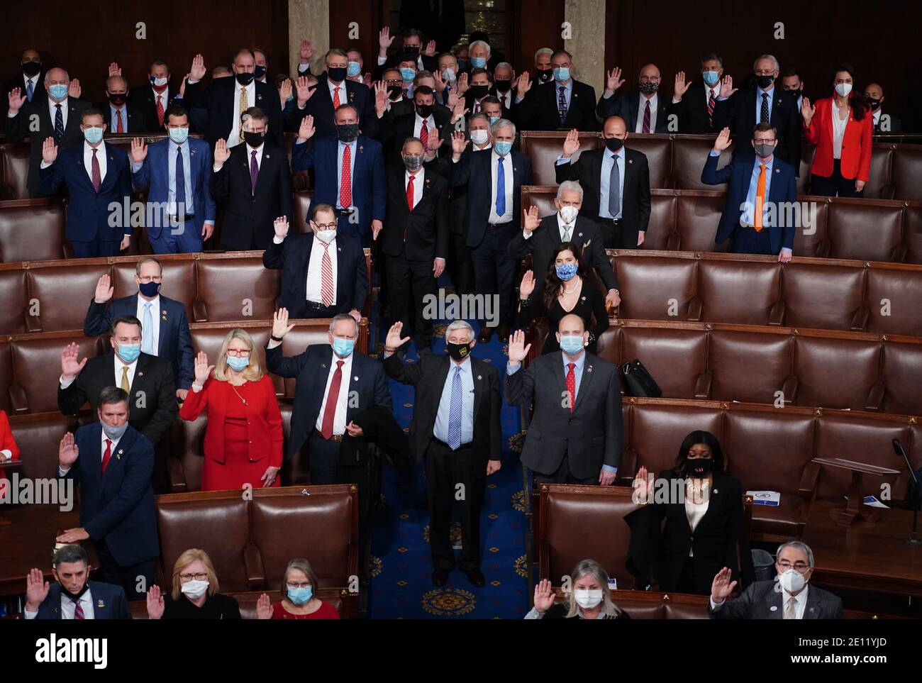 Washington, United States. 03rd Jan, 2021. Members of the House of Representatives are sworn-in during the first day of the 117th Congress in the U.S. Capitol Building on Sunday, January 3, 2021. Photo by Kevin Dietsch/UPI Credit: UPI/Alamy Live News Stock Photo