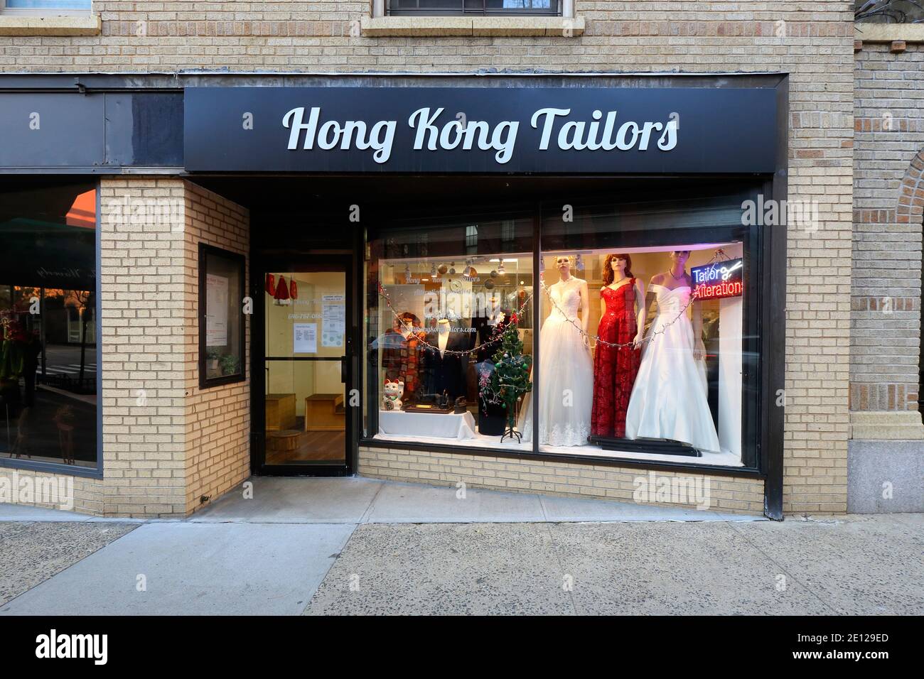 Hong Kong Tailors, 136 Waverly Pl, New York, NYC storefront photo of a tailor shop in the Greenwich Village neighborhood of Manhattan. Stock Photo