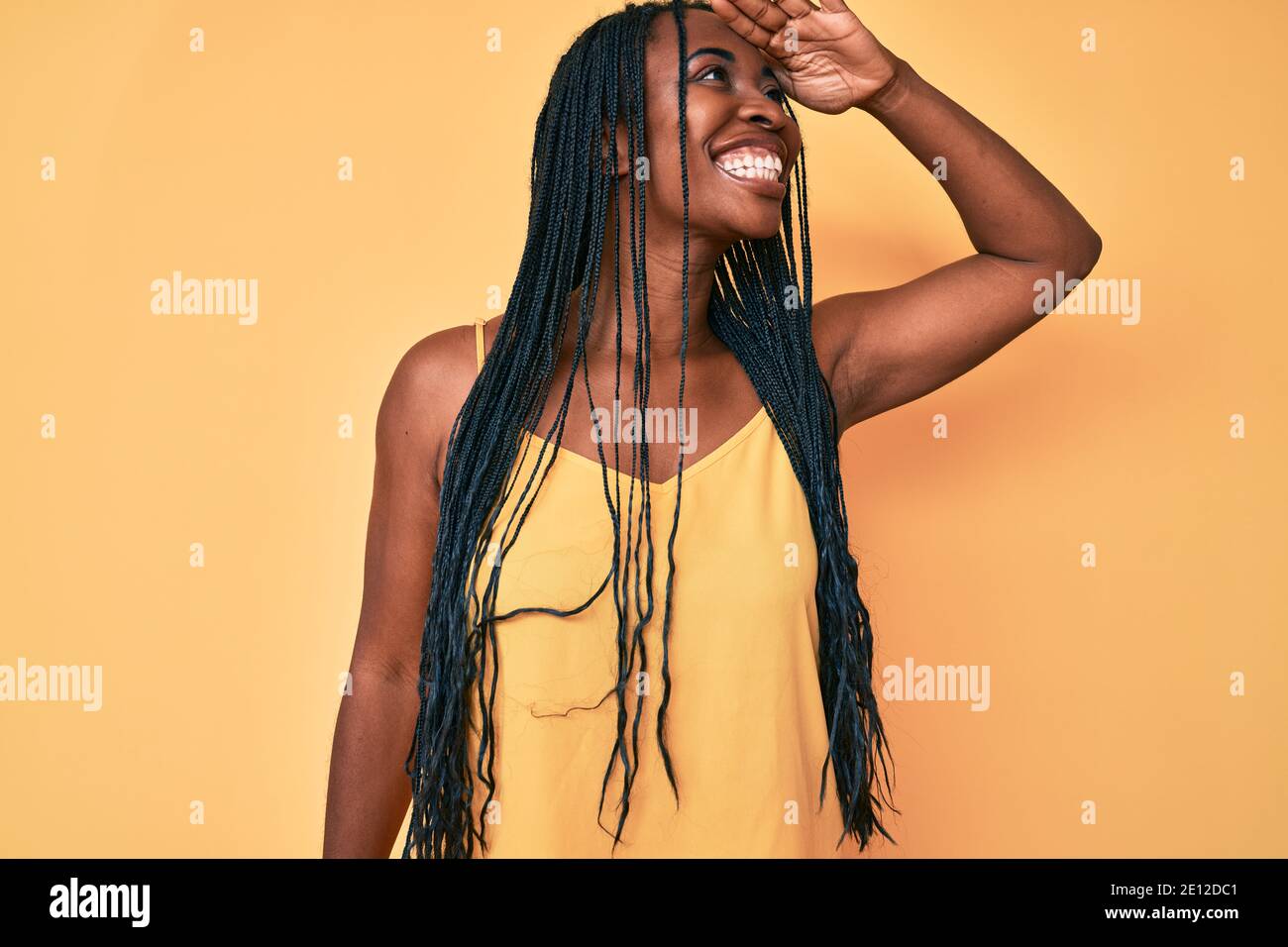 African american woman with braids wearing casual clothes very happy ...