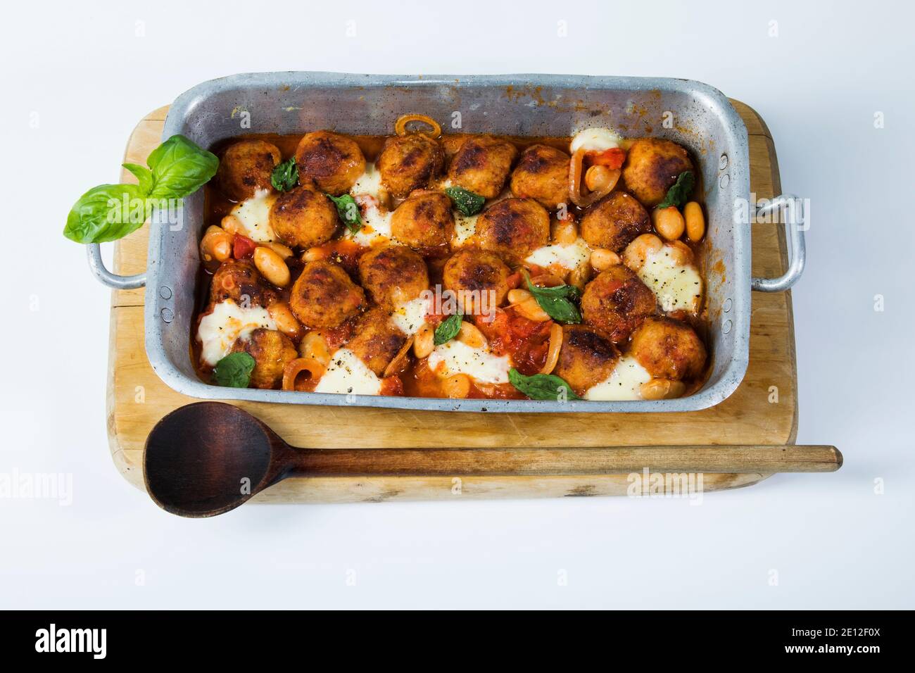 Casserole With Meatballs, Giant Beans, Tomatoes, Mozarella And Basil Stock Photo