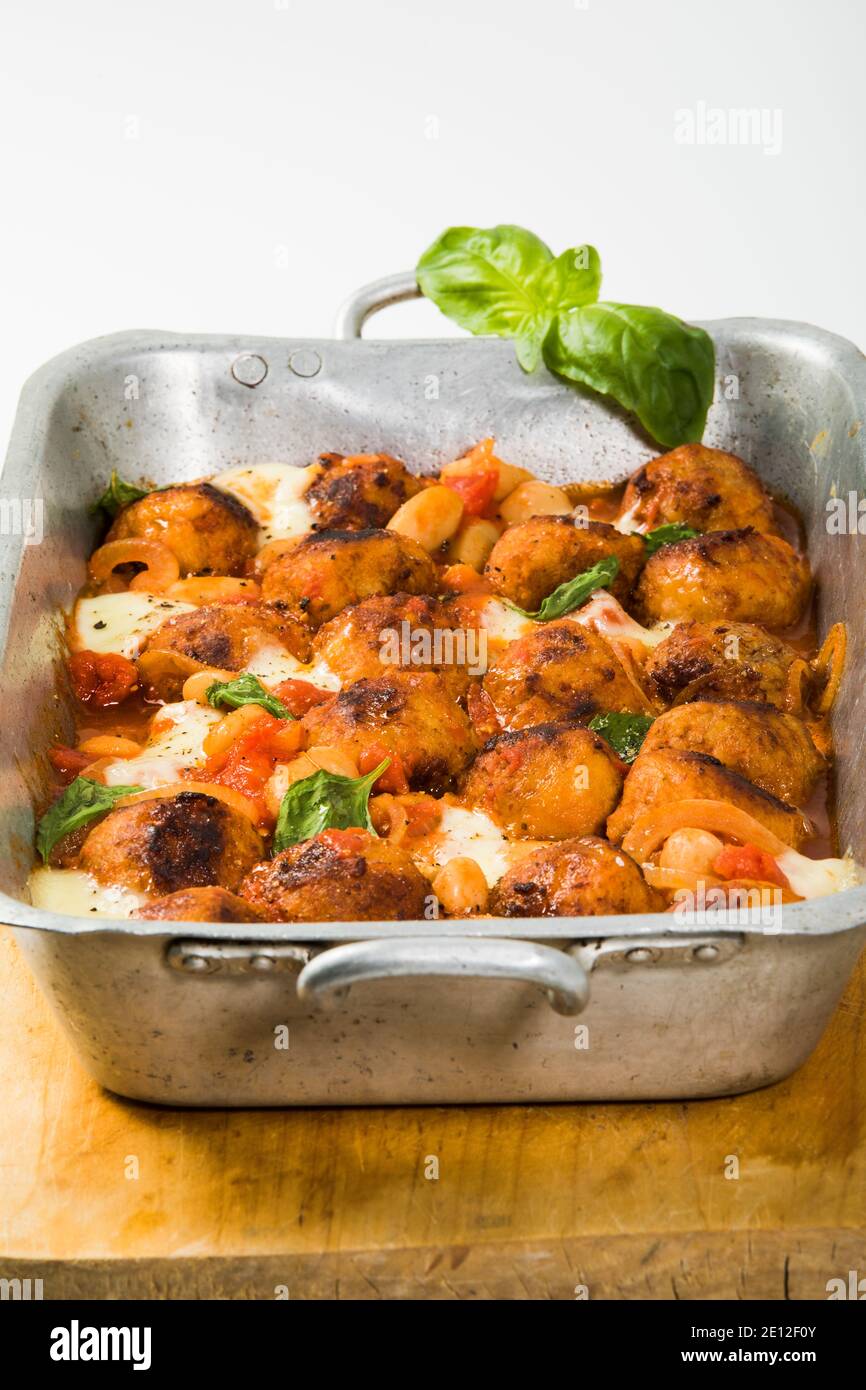 Casserole With Meatballs, Giant Beans, Tomatoes, Mozarella And Basil Stock Photo