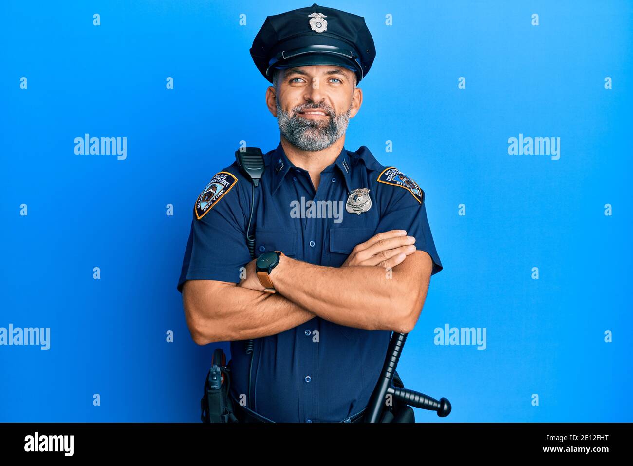 Friendly male police officer looking hi-res stock photography and ...