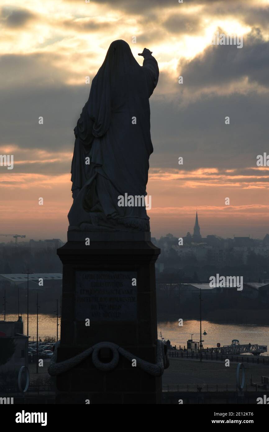 statue of saint anne in the morning with port Stock Photo Alamy