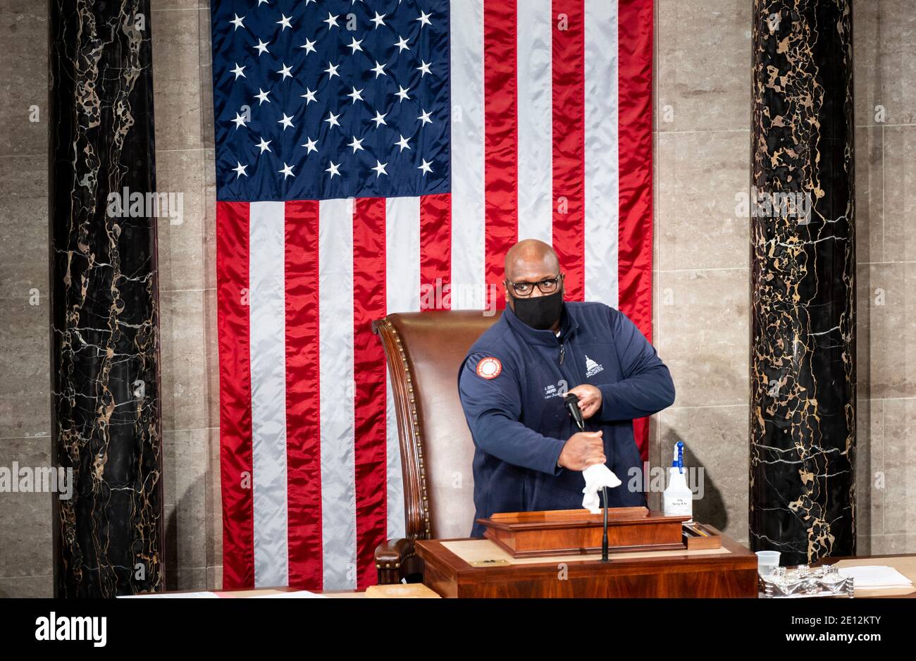United States Capitol workers disinfect the House floor in the Capitol before members of the 117th Congress are sworn in on Sunday, January 3, 2021.Credit: Bill Clark/Pool via CNP /MediaPunch Stock Photo