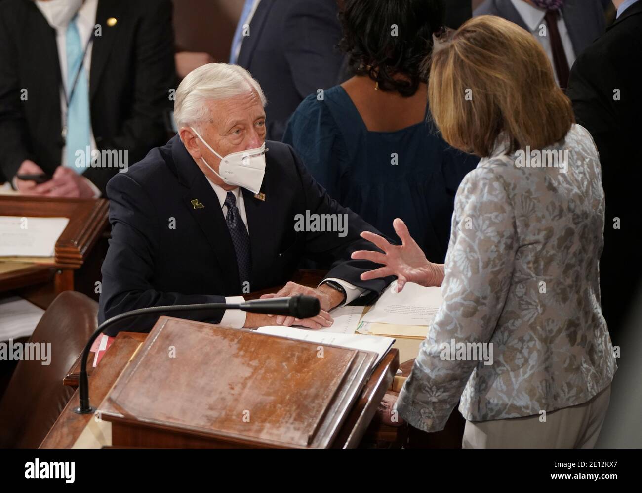 U.S. House Majority Leader Steny Hoyer (D-MD) talks with Speaker of the House Nancy Pelosi during the first session of the 117th Congress on Capitol Hill in Washington, U.S., January 3, 2021.   REUTERS/Joshua Roberts Stock Photo