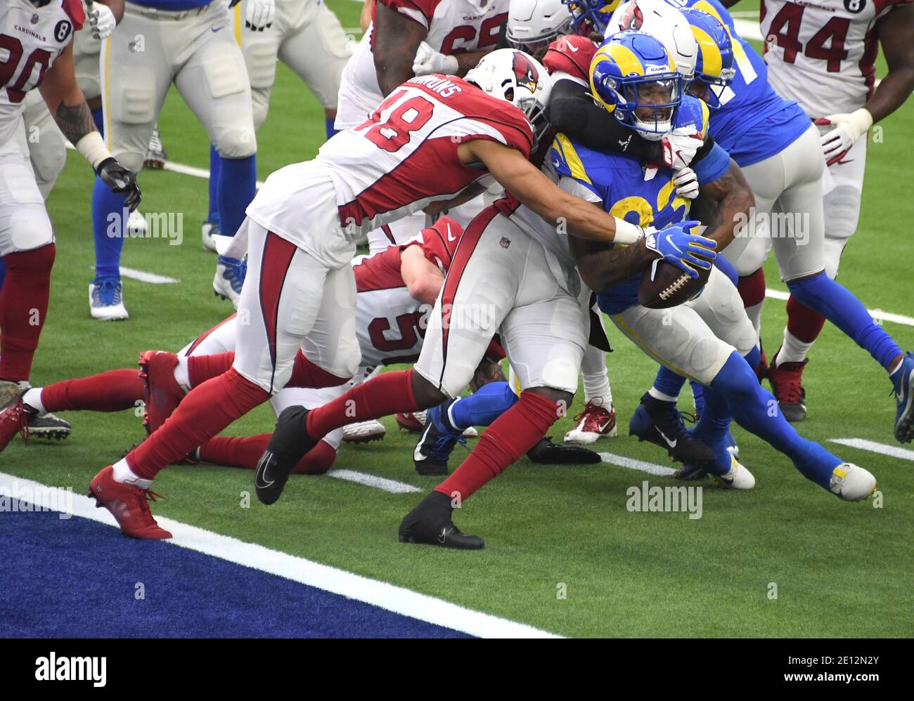 Inglewood, United States. 03rd Jan, 2021. Los Angeles Rams running back Cam Akers (23) is stripped of the ball by Arizona Cardinals Isaiah Simmons (48) at SoFi Stadium in Inglewood, California on Sunday, January 3, 2021. The Rams defeated the Cardinals 18-7. Photo by Jon SooHoo/UPI Credit: UPI/Alamy Live News Stock Photo