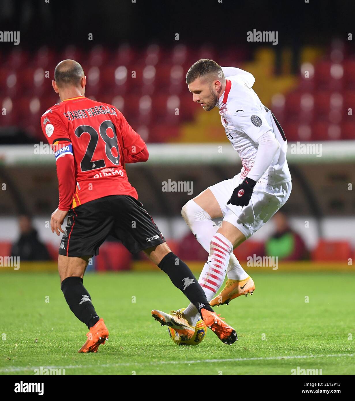 Benevento, Italy. 3rd Jan, 2021. AC Milan's Ante Rebic (R) vies with Benevento's Pasquale Schiattarella during a Serie A match between Benevento and AC Milan in Benevento, Italy, Jan. 3, 2021. Credit: Daniele Mascolo/Xinhua/Alamy Live News Stock Photo