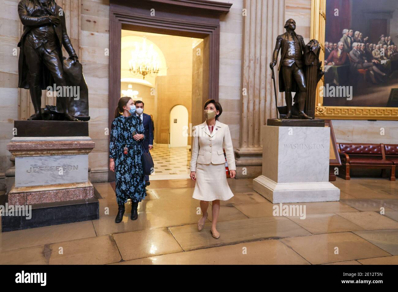 Washington, DC. 03rd Jan, 2021. United States Representative-elect Young Kim (Republican of California) (R) walks in the US Capitol on January 03, 2021 in Washington, DC. Both chambers are holding rare Sunday sessions to open the new Congress on January 3 as the Constitution requires.Credit: Tasos Katopodis/Pool via CNP | usage worldwide Credit: dpa/Alamy Live News Stock Photo