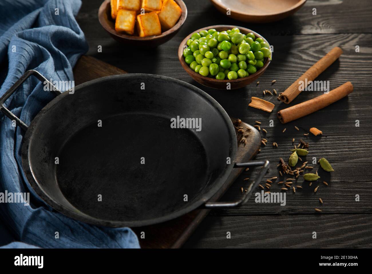Empty pan next to peas and cottage cheese. Stock Photo