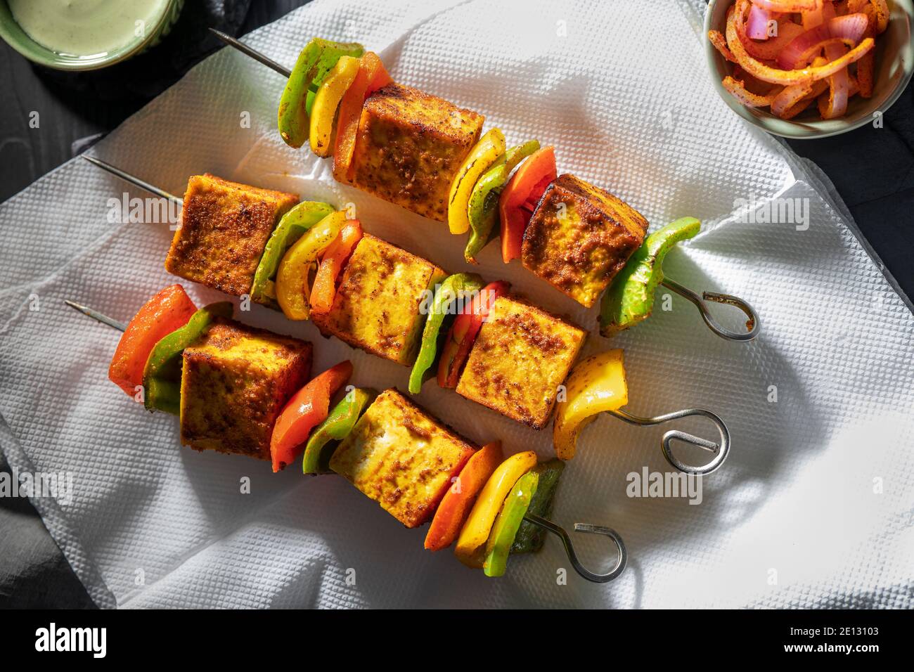 Paneer tikka with Mint chutney and onion rings Stock Photo Alamy