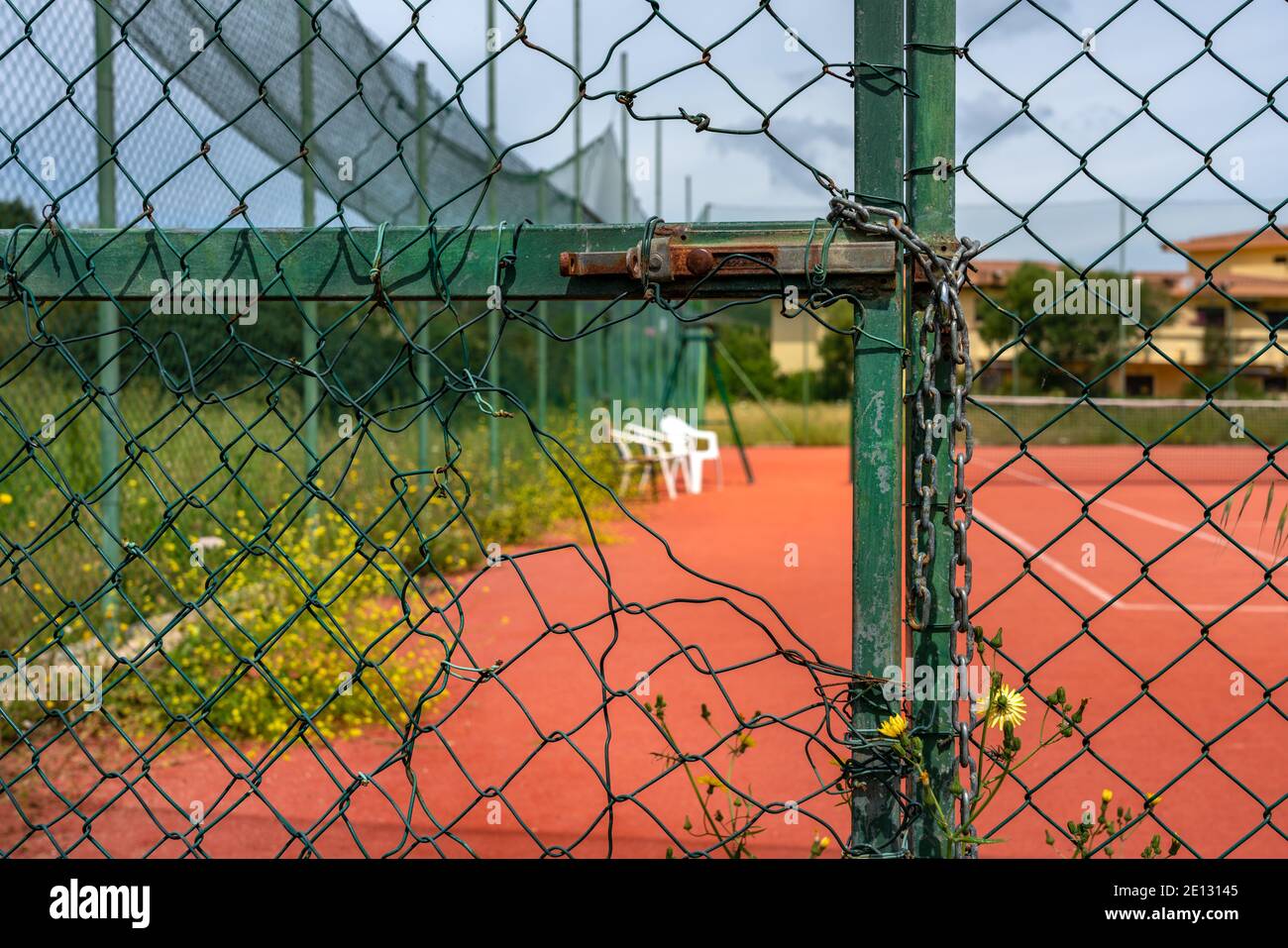 Damaged Fence At A Tennis Court Stock Photo Alamy
