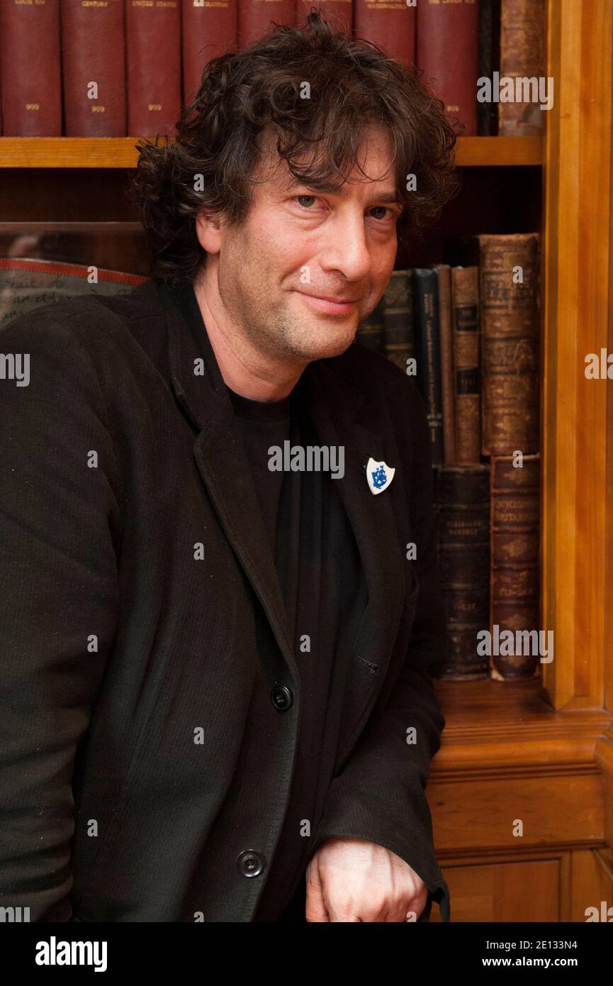 Bestselling author Neil Gaiman, photographed in the Covent Garden Hotel, London, has long been one of the top writers in modern comics, as well as writing books for readers of all ages. He is listed in the Dictionary of Literary Biography as one of the top ten living post-modern writers, and is a prolific creator of works of prose, poetry, film, journalism, comics, song lyrics, and drama.  His New York Times bestselling 2001 novel for adults, American Gods, was awarded the Hugo, Nebula, Bram Stoker, SFX, and Locus awards, was nominated for many other awards, including the World Fantasy Award a Stock Photo