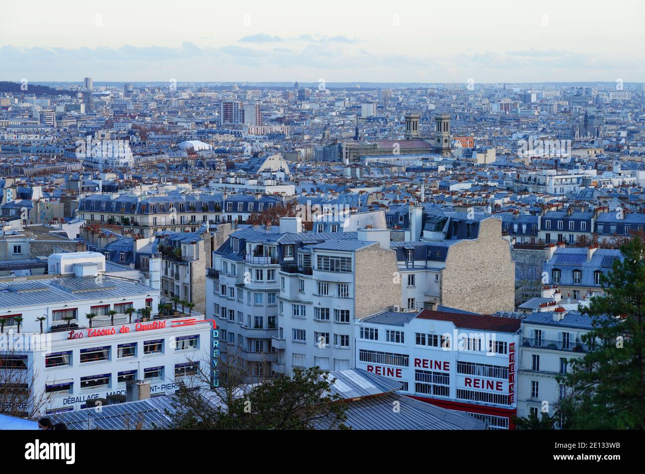 PARIS, FRANCE -20 DEC 2020- Landscape view of roofs in Paris seen from the Montmartre hill in the 18th arrondissement of Paris, France. Stock Photo